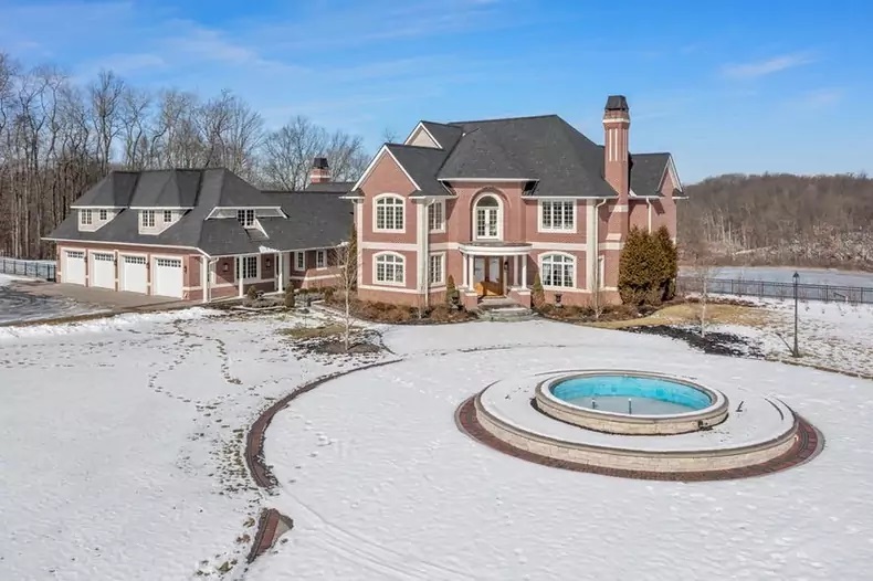 A Michigan mansion on sale for $6 million has a luxury 'prepper' bunker with a hidden entrance and soundproof gun range