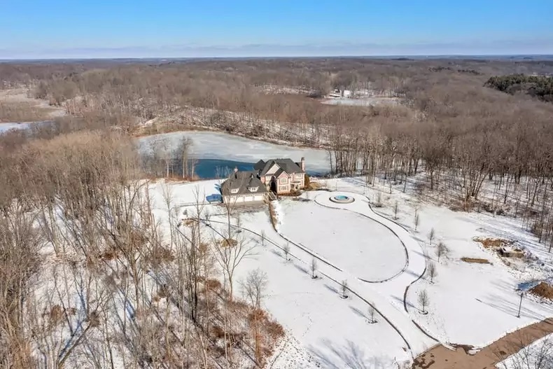 A Michigan mansion on sale for $6 million has a luxury 'prepper' bunker with a hidden entrance and soundproof gun range